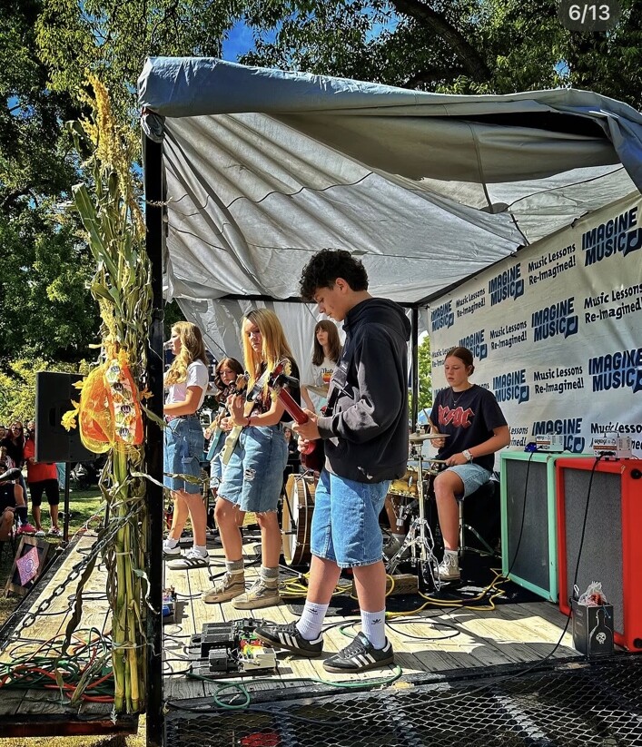 Imagine Music Rock Academy students and teachers together at Harvest Moon